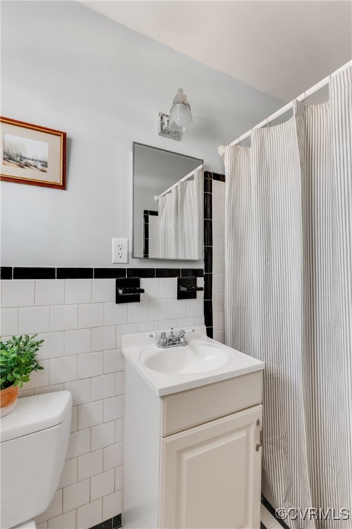 208 Tamarack Road Henrico, VA 23229 - Photo 23 of 35 a bathroom with a sink a toilet and mirror