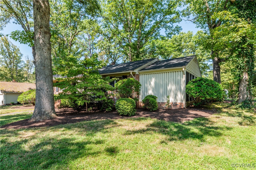 208 Tamarack Road Henrico, VA 23229 - Photo 32 of 35 a front view of a house with garden