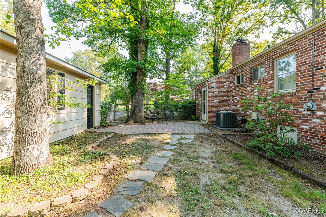 208 Tamarack Road Henrico, VA 23229 - Photo 35 of 35 a backyard of a house with garden and outdoor seating