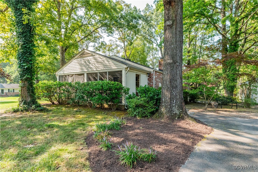 208 Tamarack Road Henrico, VA 23229 - Photo 5 of 35 a front view of a house with a yard and trees