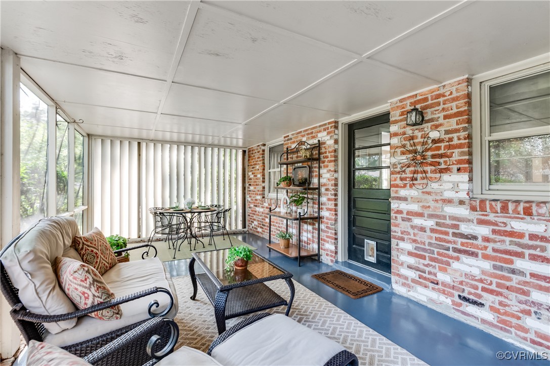 208 Tamarack Road Henrico, VA 23229 - Photo 6 of 35 a living room with furniture and a floor to ceiling window