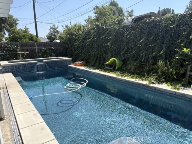 6041 Hamilton Drive Riverside, CA 92506 - Photo 2 of 3 a view of swimming pool from a balcony