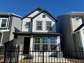 1840 Woodland Field Crossing, Unit 207 Spring, TX 77380 - Photo 1 of 15 a front view of a house