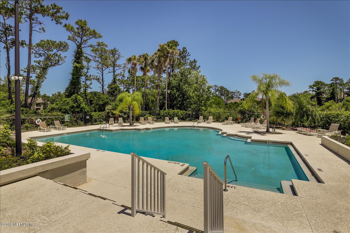 3112 Haley Pointe Road St. Augustine, FL 32084 - Photo 18 of 23 a view of a swimming pool and a yard