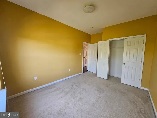 an empty room with a natural light