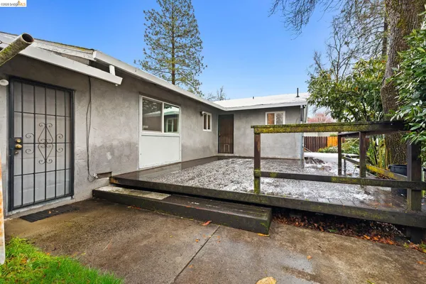 a view of house with outdoor space