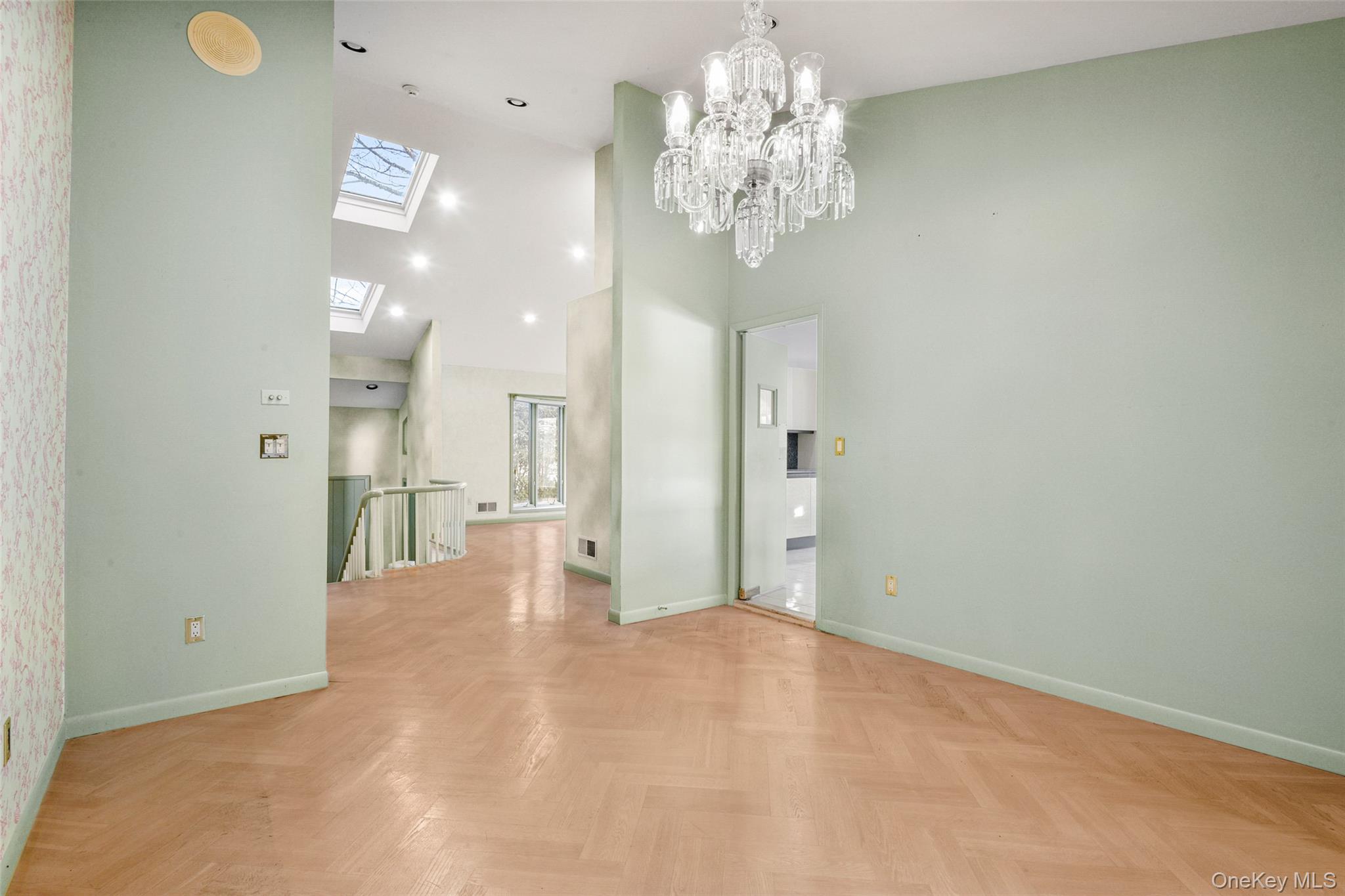31 Clover Place New Rochelle, NY 10805 - Photo 11 of 44 a view of a chandelier in big room and chandelier