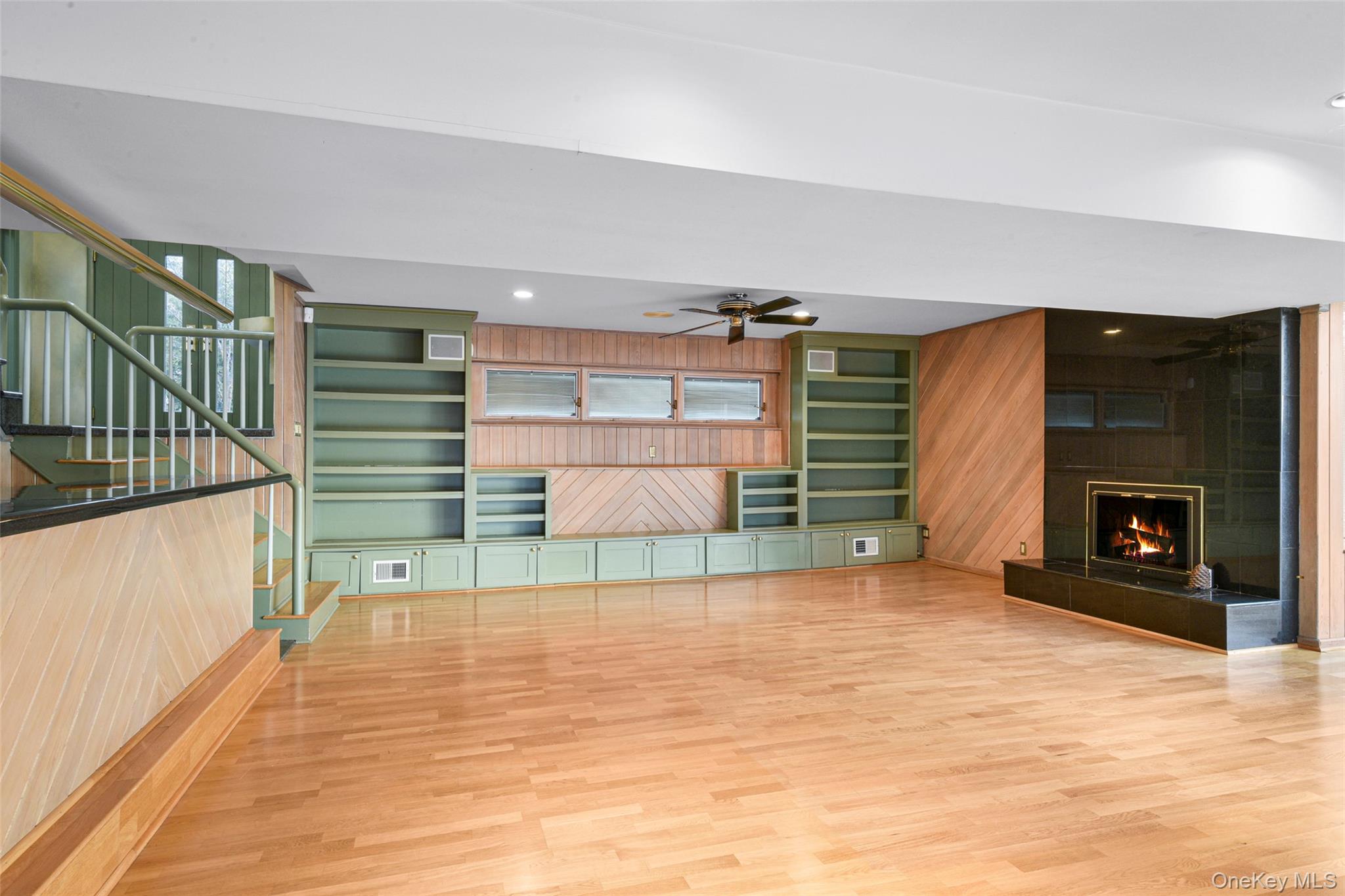 31 Clover Place New Rochelle, NY 10805 - Photo 30 of 44 a view of a livingroom with a fireplace and window
