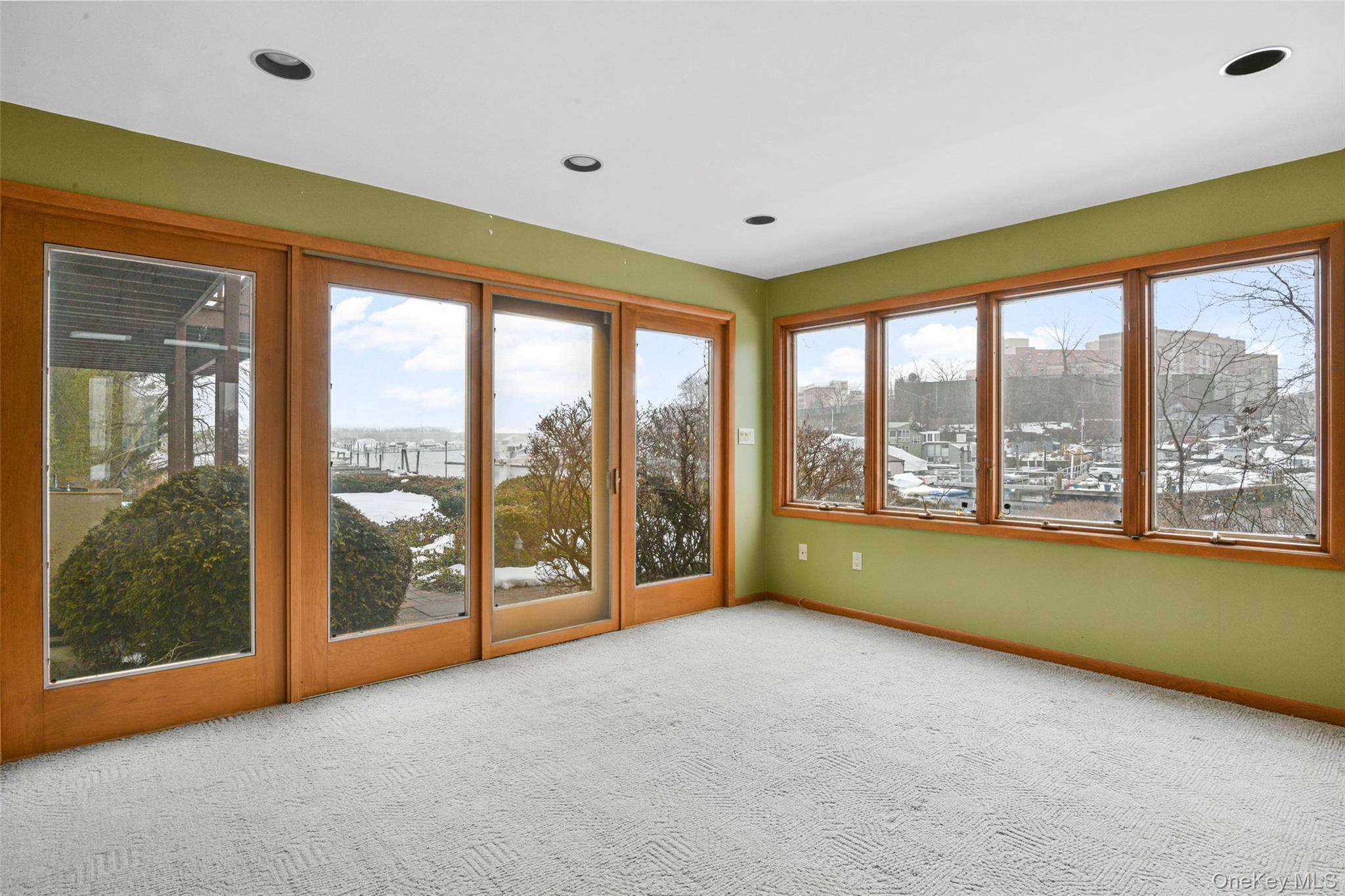 31 Clover Place New Rochelle, NY 10805 - Photo 35 of 44 a big room with wooden floor and windows
