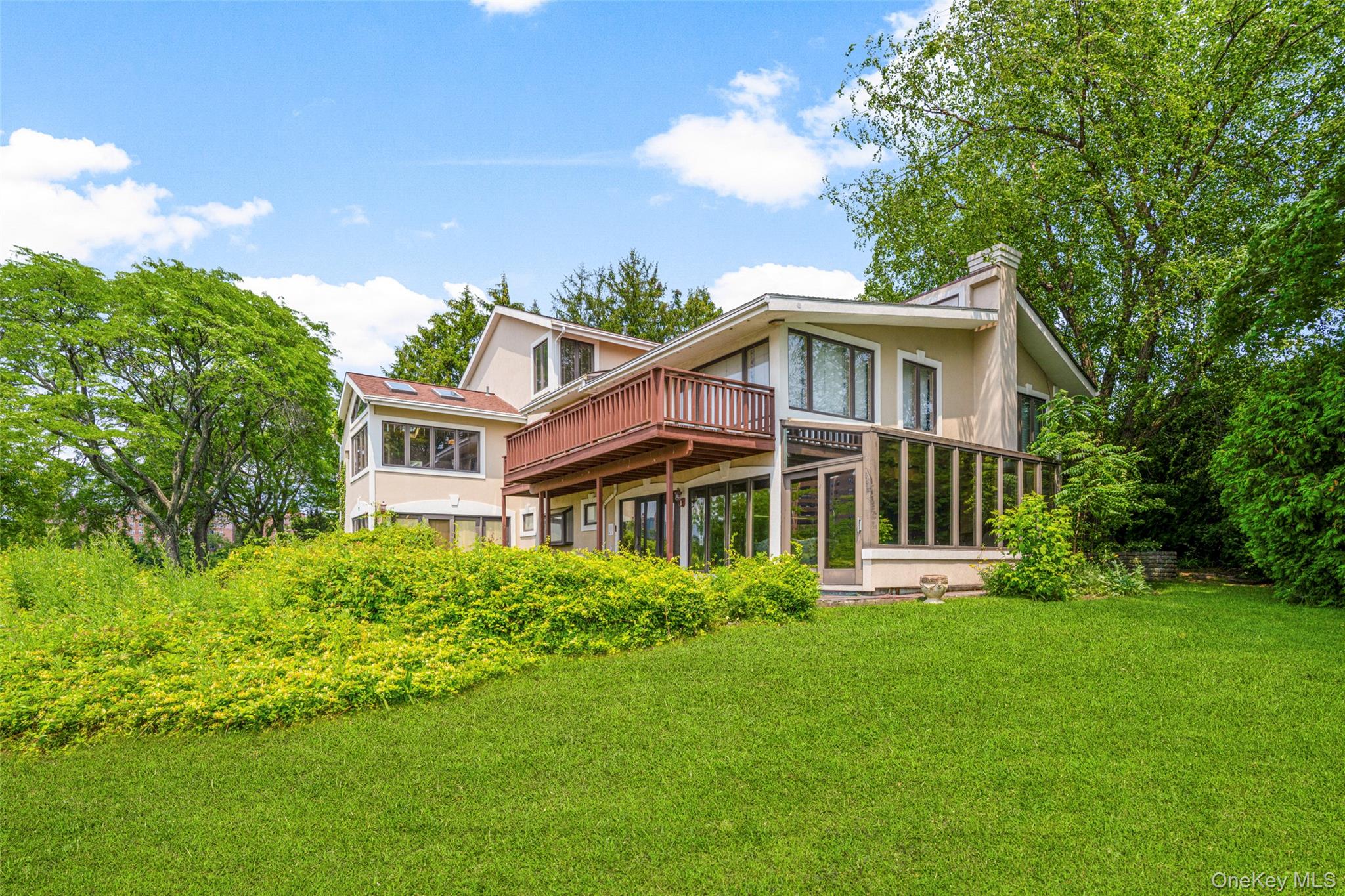 31 Clover Place New Rochelle, NY 10805 - Photo 40 of 44 a front view of a house with a yard
