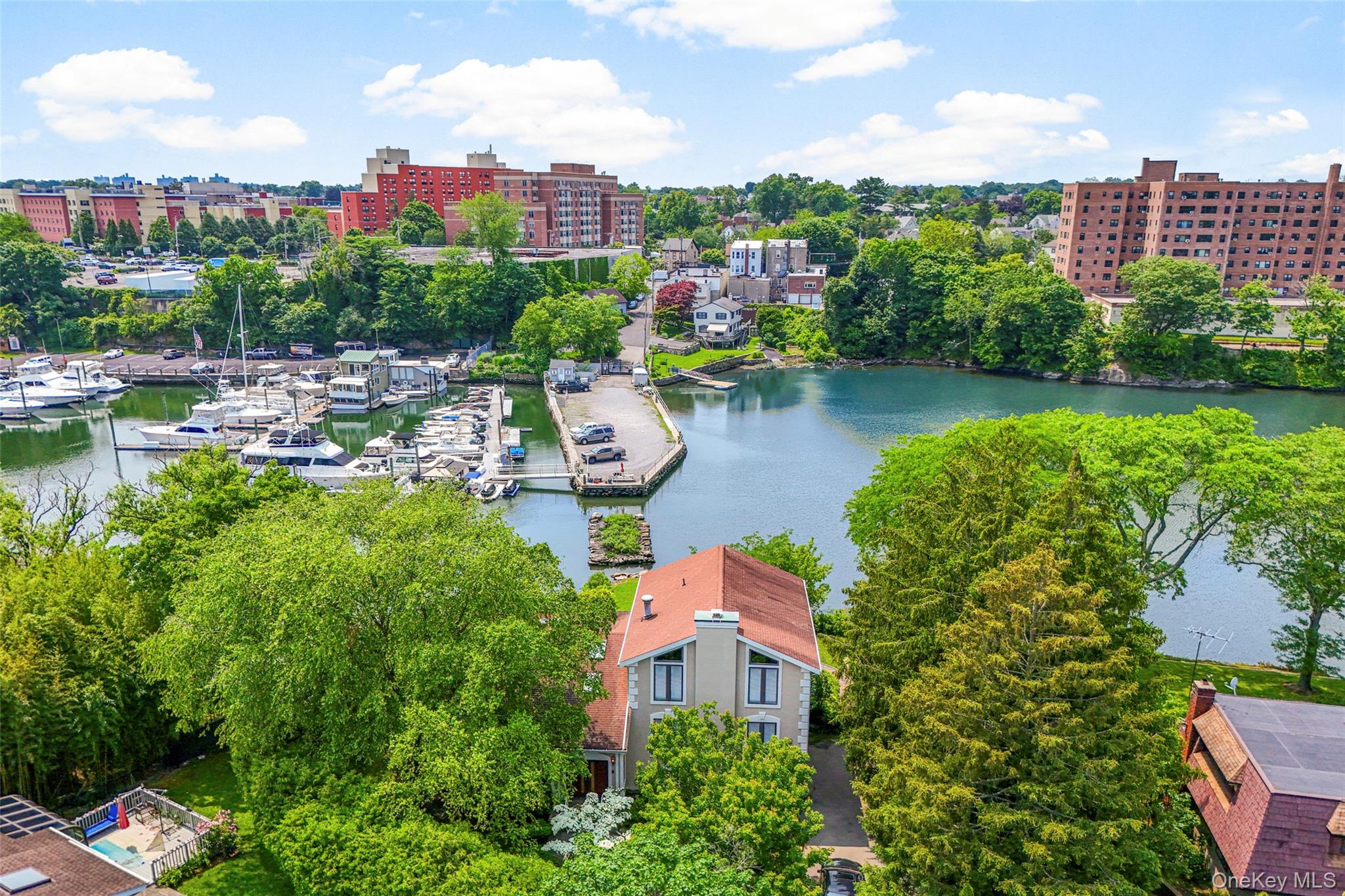 31 Clover Place New Rochelle, NY 10805 - Photo 41 of 44 a aerial view of a city with a lake