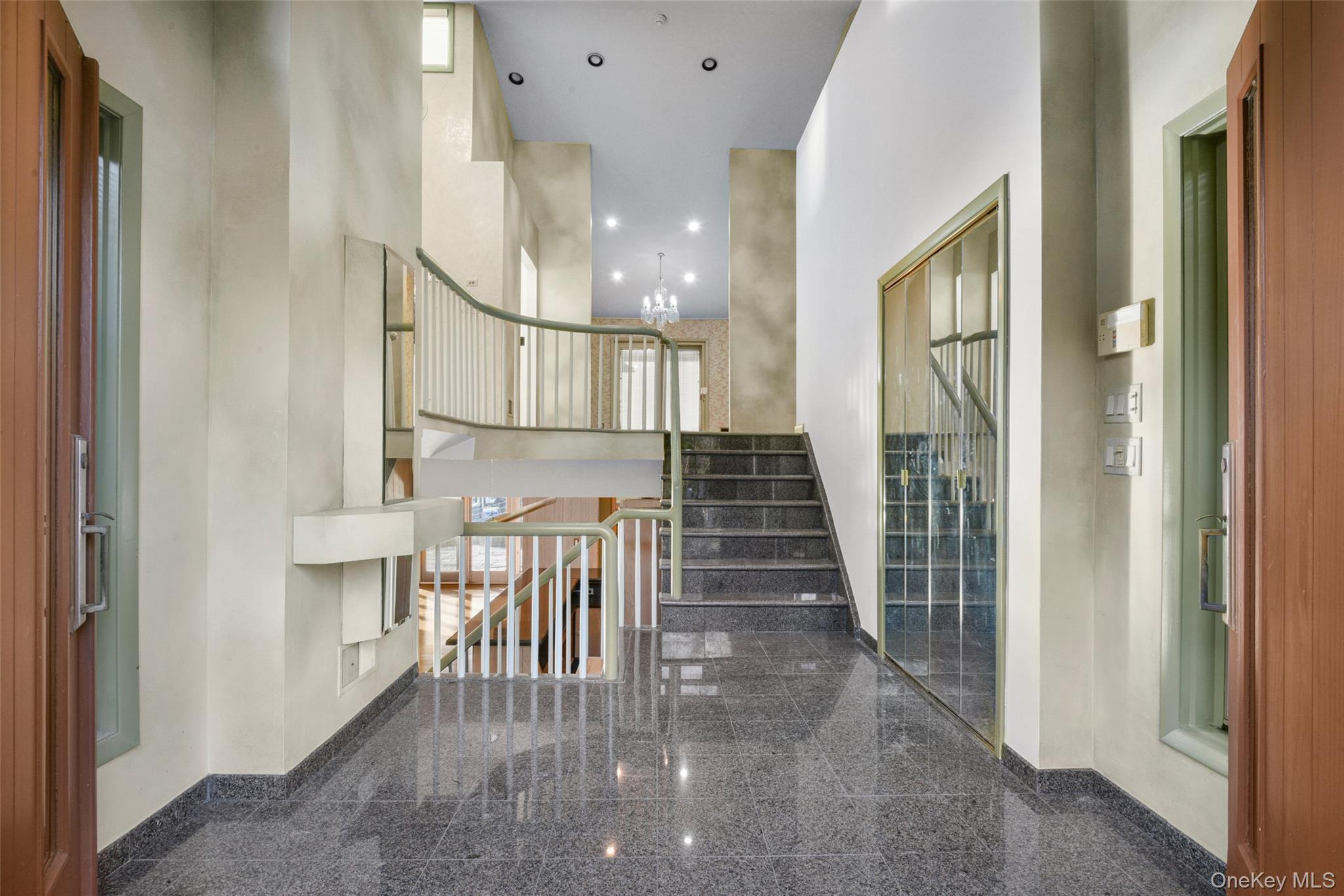 31 Clover Place New Rochelle, NY 10805 - Photo 6 of 44 a view of entryway and hall with wooden floor