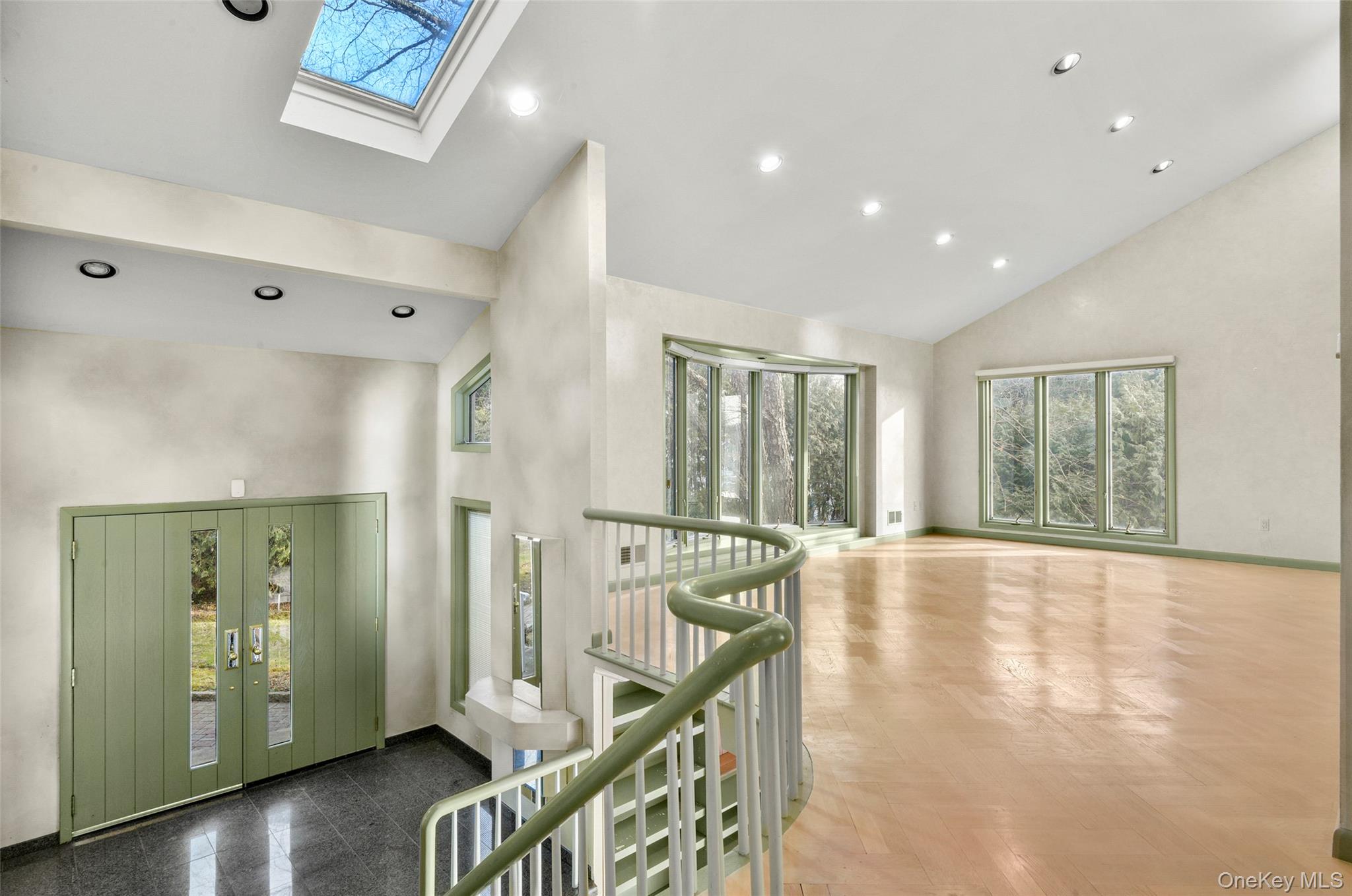 31 Clover Place New Rochelle, NY 10805 - Photo 7 of 44 a view of an entryway with wooden floor