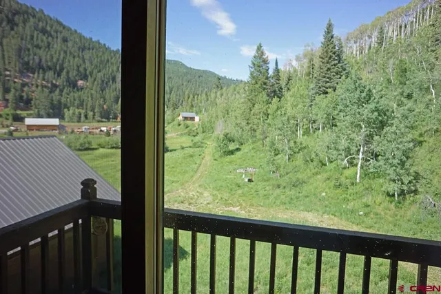 a view of a balcony with outdoor space