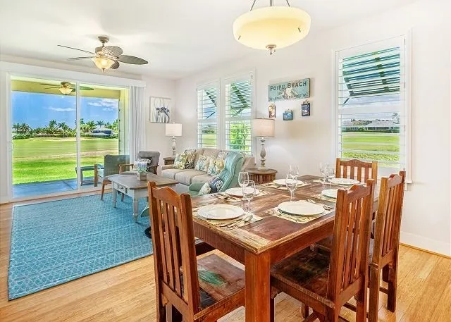 a view of a dining room with furniture window and outside view