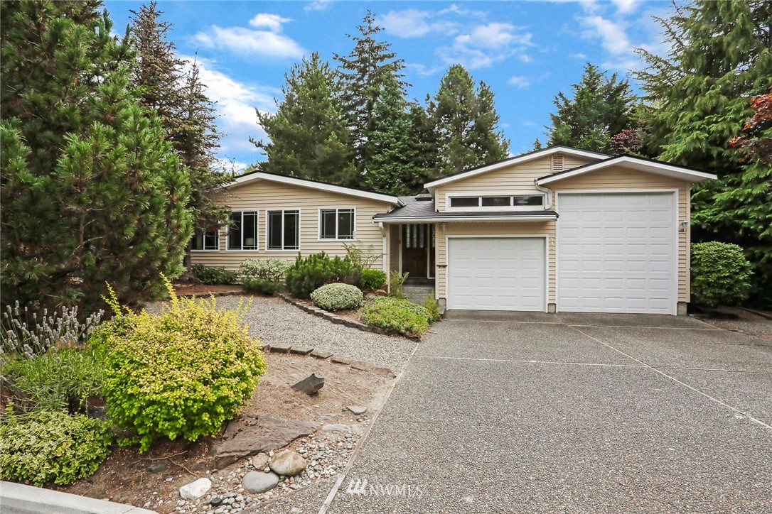 930 243rd Street Southwest Bothell, WA 98021 - Photo 1 of 37 front view of house with a yard