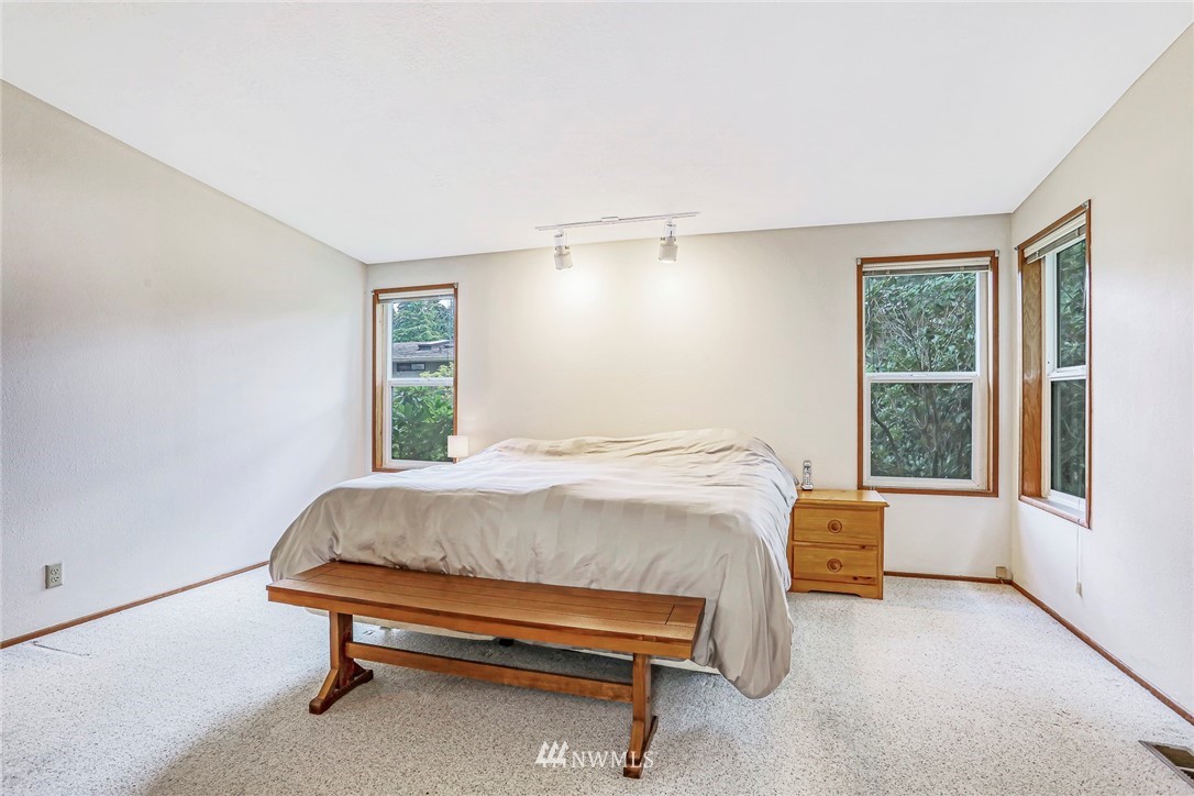930 243rd Street Southwest Bothell, WA 98021 - Photo 16 of 37 a bedroom with a bed and window