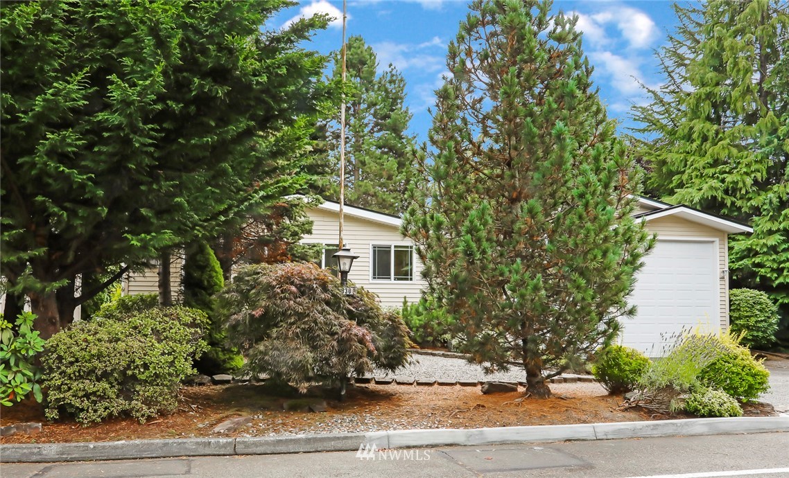 930 243rd Street Southwest Bothell, WA 98021 - Photo 31 of 37 front view of a house with a yard