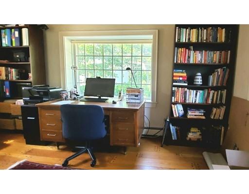10 Mercer Road Needham, MA 02494 - Photo 11 of 22 a view of a workspace with furniture and a bookshelf