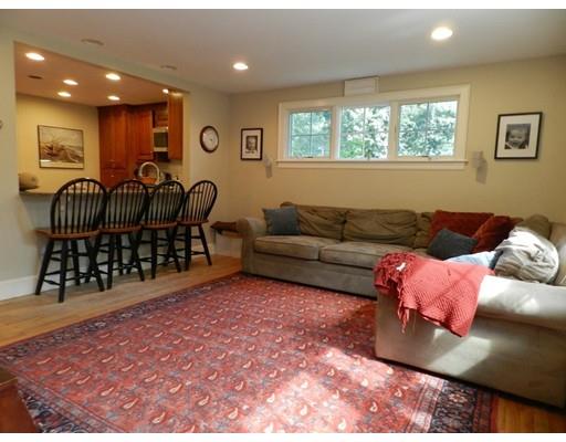 10 Mercer Road Needham, MA 02494 - Photo 6 of 22 a living room with furniture a ceiling fan and a rug