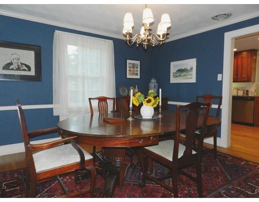 10 Mercer Road Needham, MA 02494 - Photo 8 of 22 a view of a dining room with furniture and chandelier