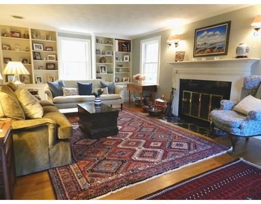 10 Mercer Road Needham, MA 02494 - Photo 9 of 22 a living room with furniture and a fireplace