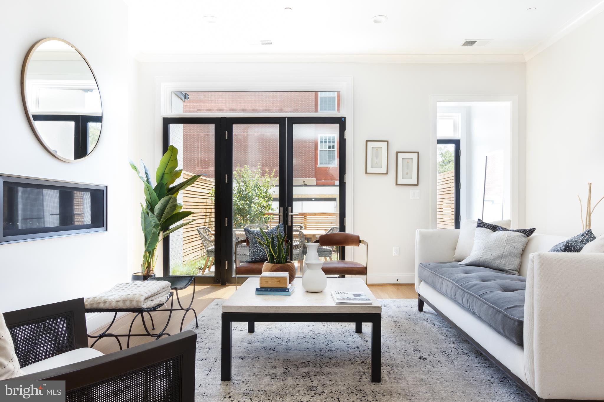 1325 D Street Southeast Washington, DC 20003 - Photo 5 of 16 Living room looking to patio - Model