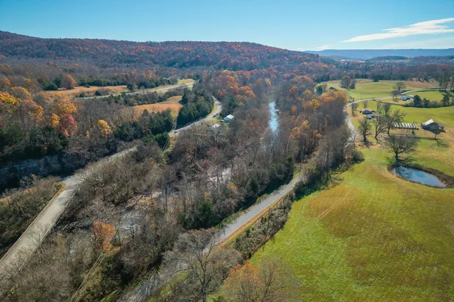 a view of a lake with mountains in the background