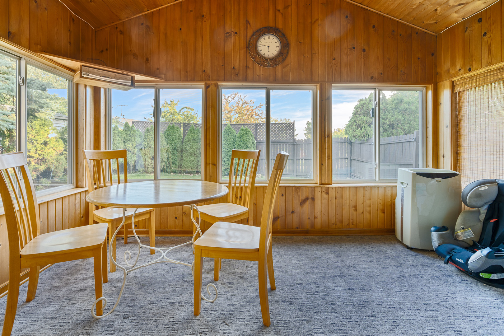909 Springfield Drive Roselle, IL 60172 - Photo 32 of 42 a dining room with furniture and a large window