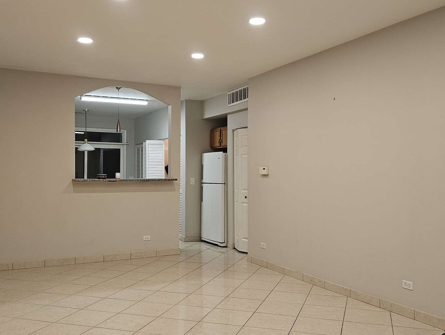 151 North Waters Edge Drive, Unit C Glendale Heights, IL 60139 - Photo 3 of 12 a view of hallway with stairs and a cabinet