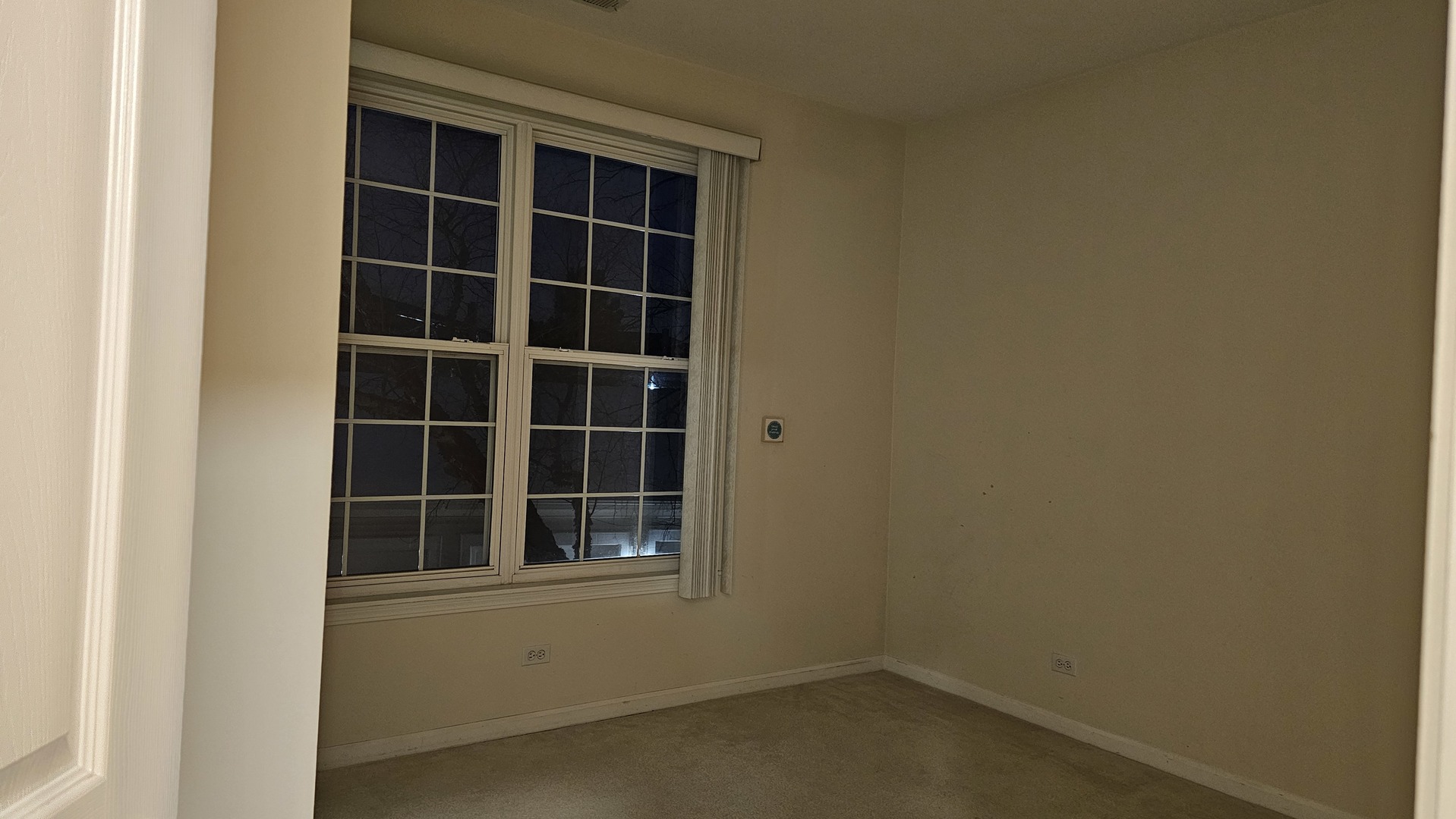 151 North Waters Edge Drive, Unit C Glendale Heights, IL 60139 - Photo 8 of 12 a view of empty room with windows