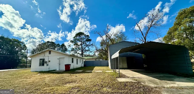 a house view with a garden space