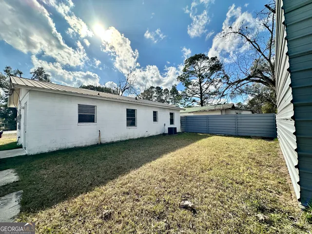 a view of a backyard with a garden
