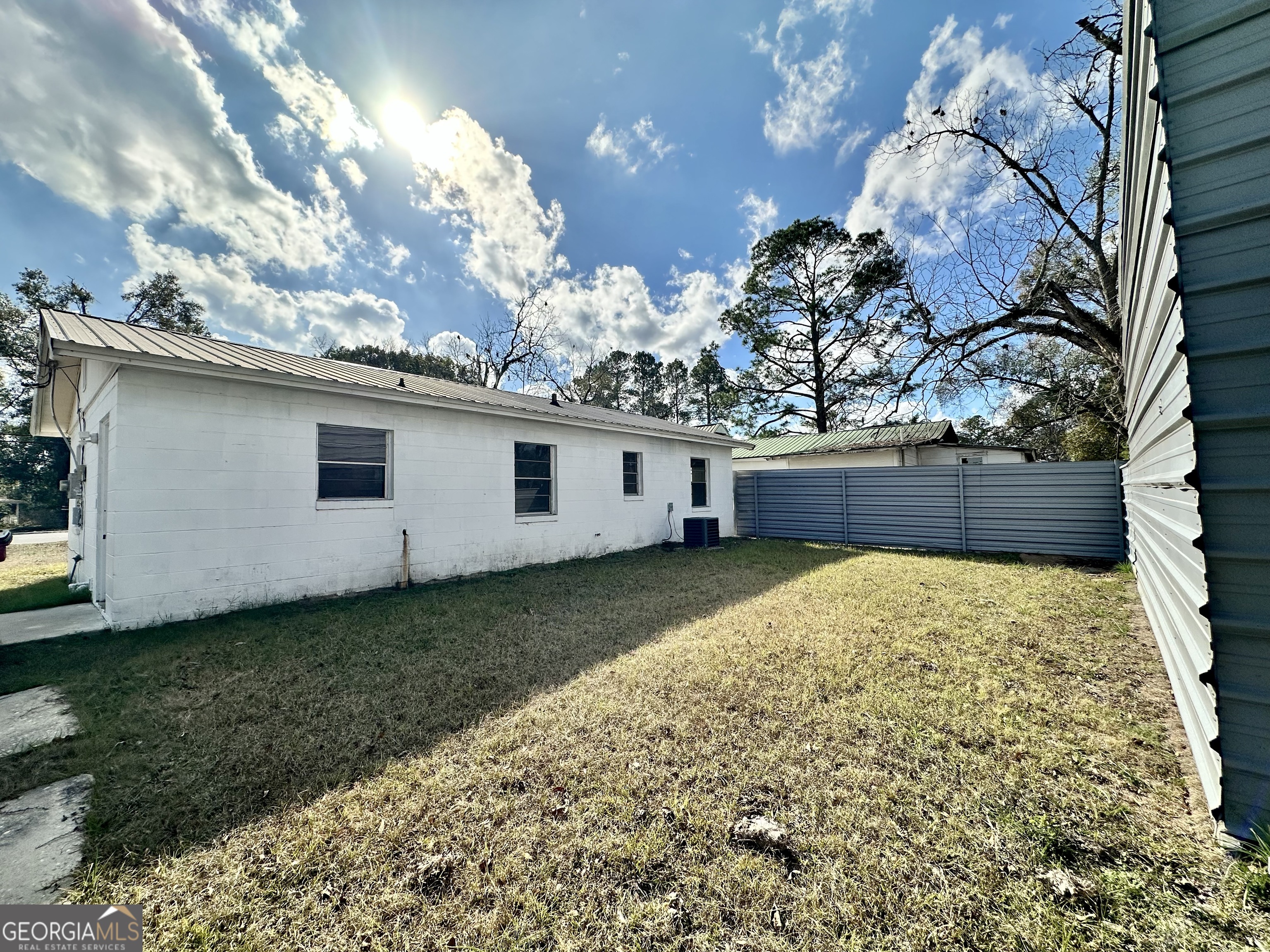 526 Ware Street Blackshear, GA 31516 - Photo 25 of 26 a view of a backyard with a garden
