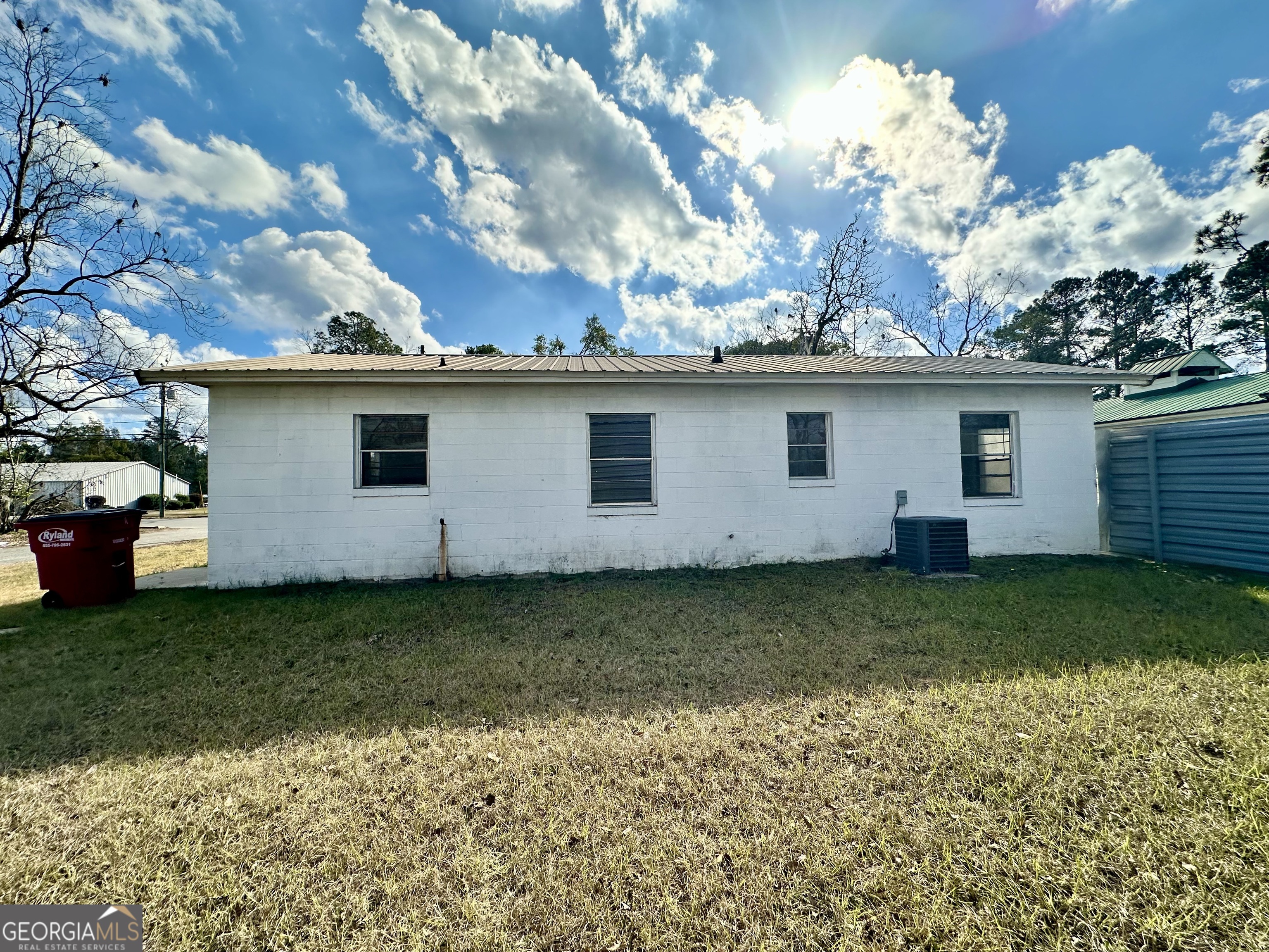 526 Ware Street Blackshear, GA 31516 - Photo 26 of 26 a house view with a garden space