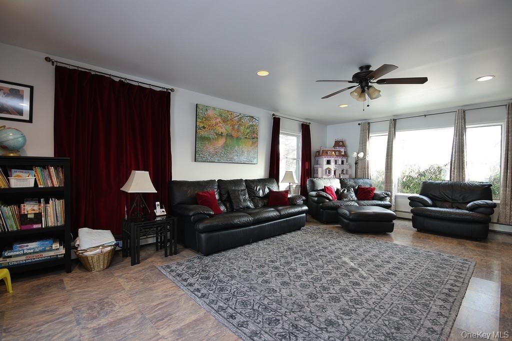 2597 Quaker Church Road Yorktown Heights, NY 10598 - Photo 13 of 37 a living room with furniture and a couch