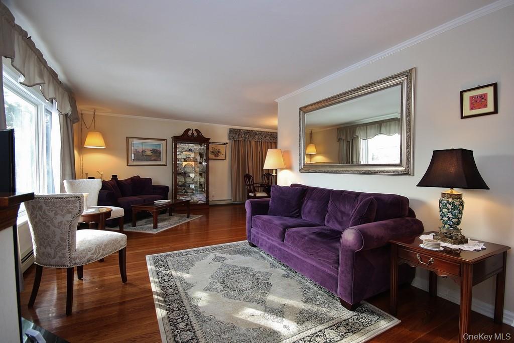 2597 Quaker Church Road Yorktown Heights, NY 10598 - Photo 8 of 37 a living room with furniture and a lamp