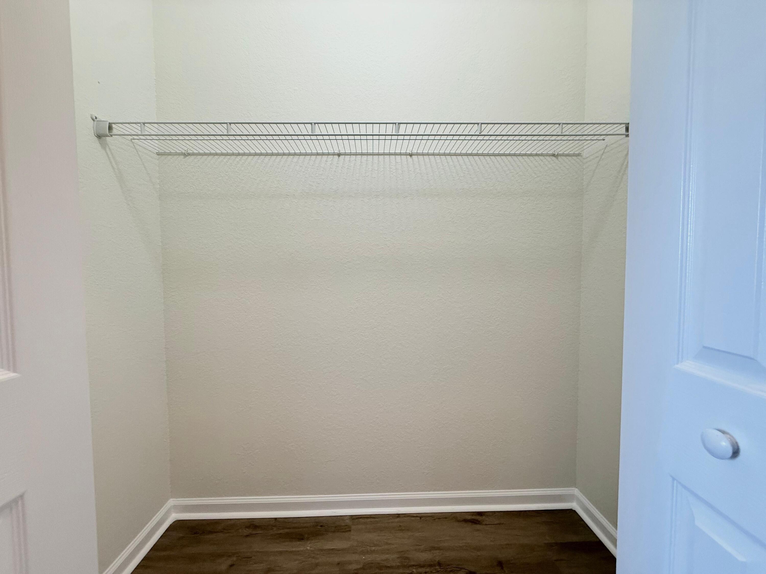 425 Greenwich Circle, Unit 206 Jupiter, FL 33458 - Photo 22 of 30 a view of small space with racks on the wall