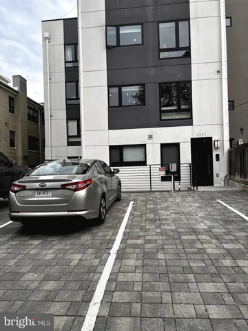 a car parked in front of a building