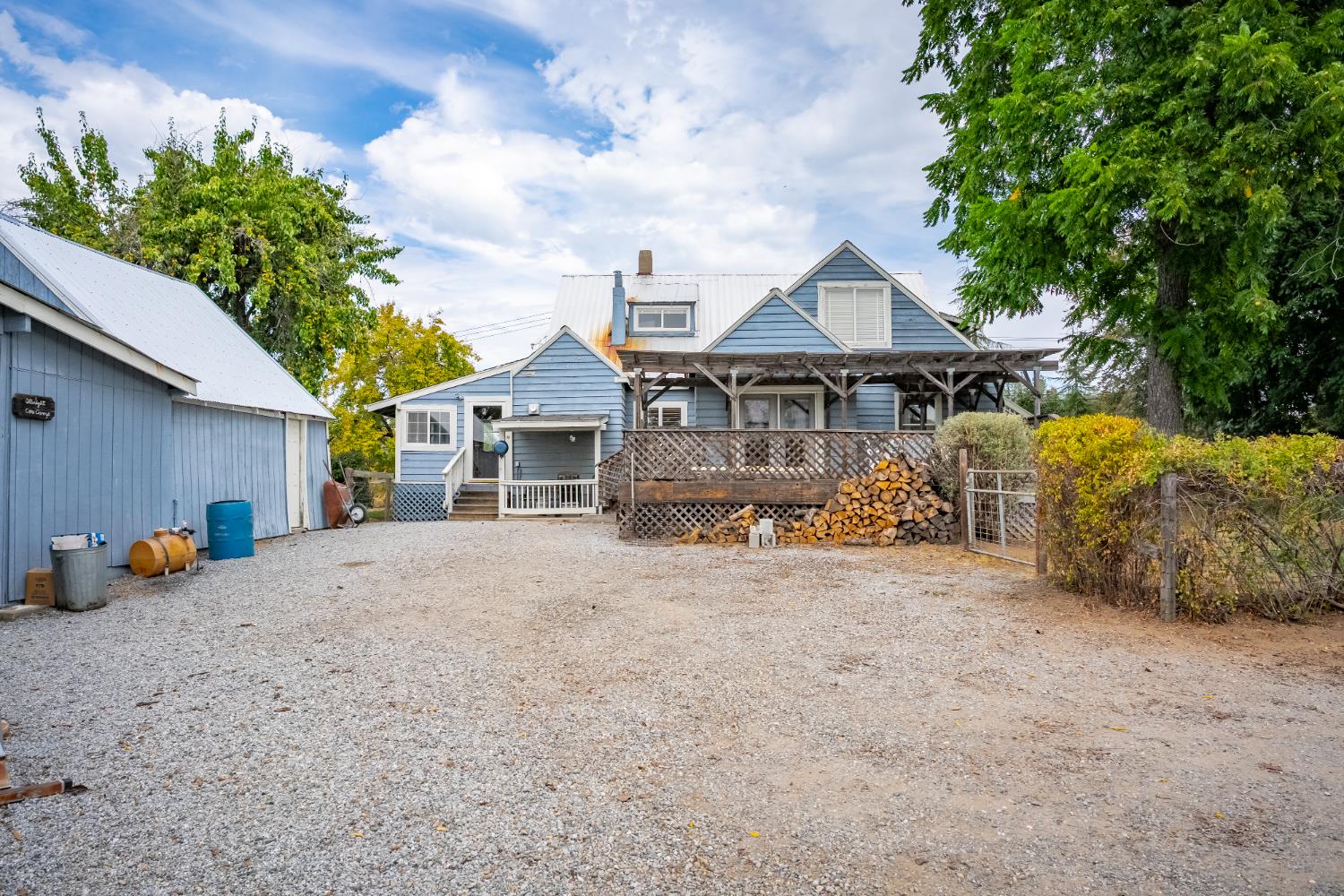 6340 Grizzly Flat Road Somerset, CA 95684 - Photo 22 of 92 a view of a house with a outdoor space and porch