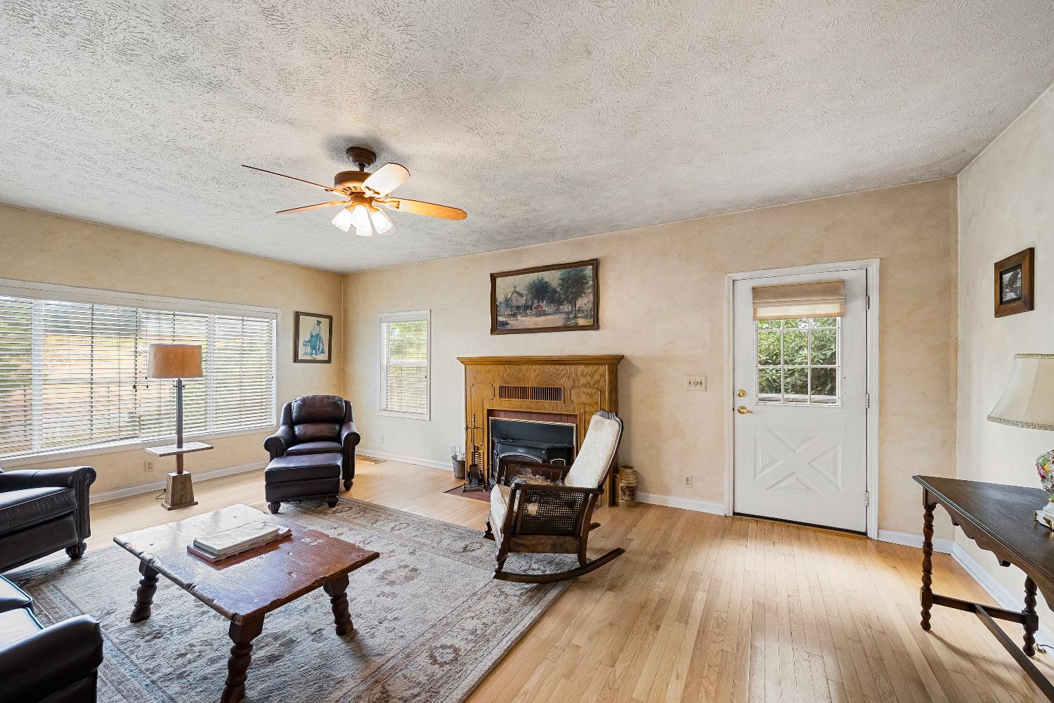 6340 Grizzly Flat Road Somerset, CA 95684 - Photo 27 of 92 a living room with furniture and a fireplace