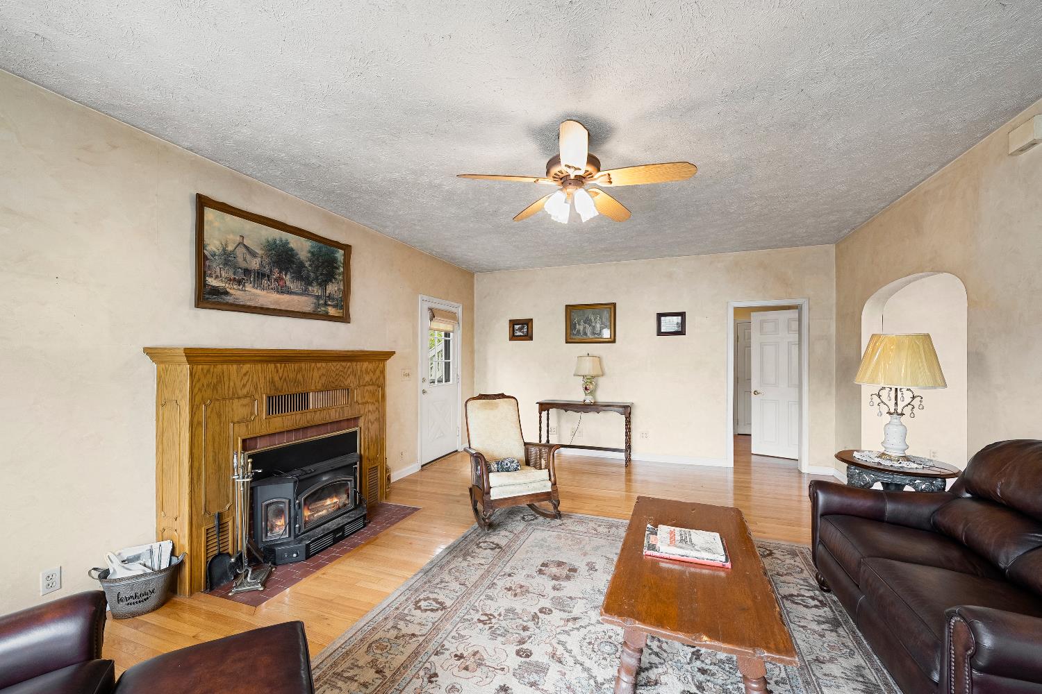 6340 Grizzly Flat Road Somerset, CA 95684 - Photo 28 of 92 a living room with furniture and a fireplace