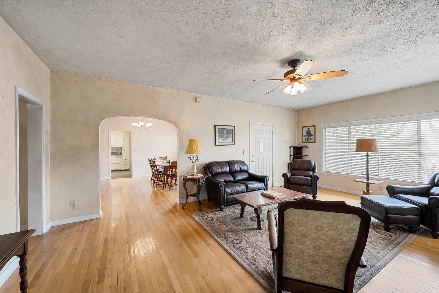 6340 Grizzly Flat Road Somerset, CA 95684 - Photo 29 of 92 a living room with furniture and wooden floor
