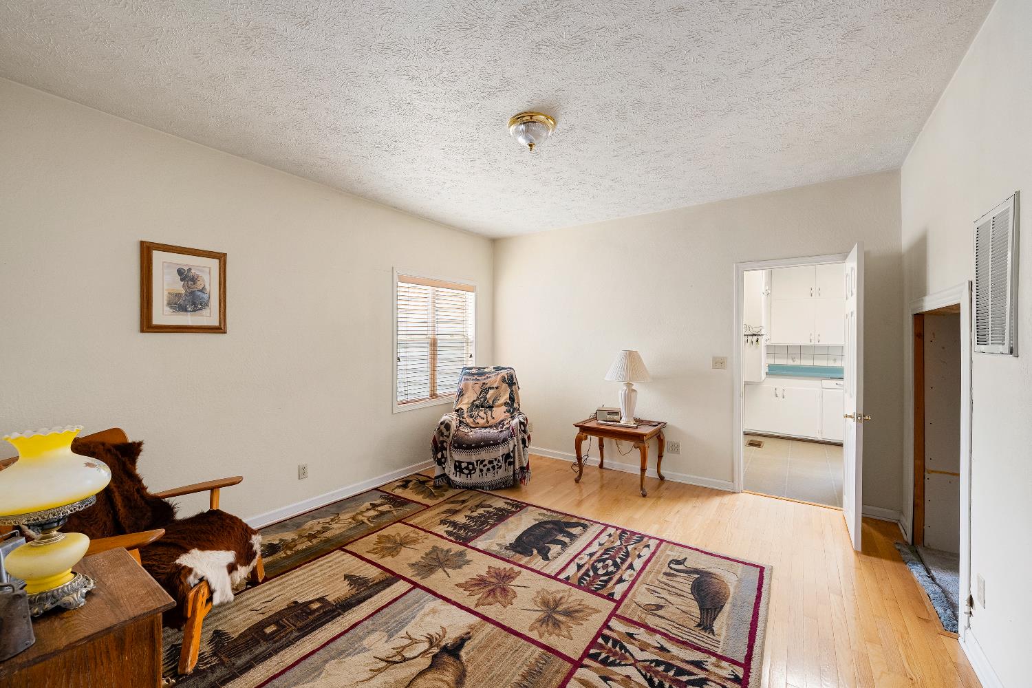 6340 Grizzly Flat Road Somerset, CA 95684 - Photo 35 of 92 a living room with furniture and wooden floor