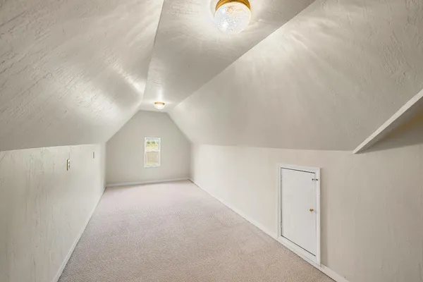 a view of a lake with houses in outdoor space