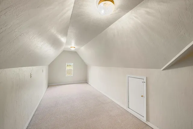 a view of a lake with houses in outdoor space