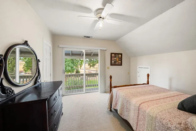 a view of a lake with a yard