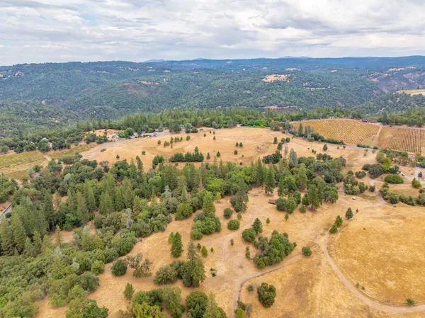 a view of a backyard with a garden