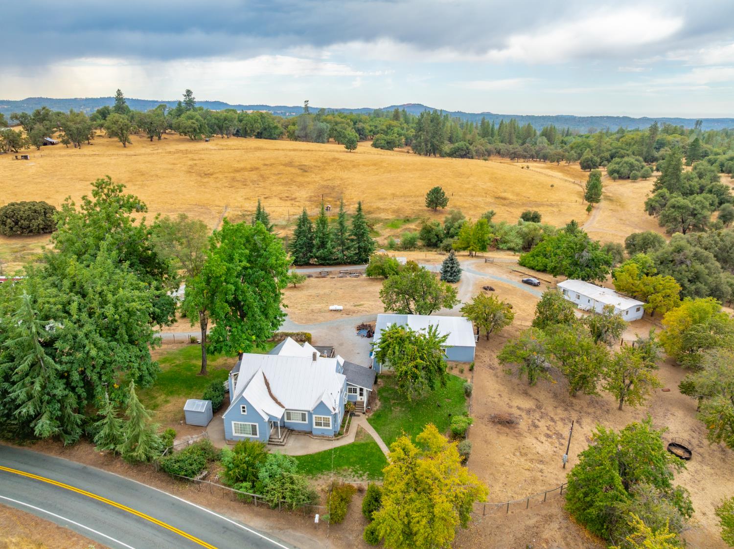 6340 Grizzly Flat Road Somerset, CA 95684 - Photo 86 of 92 a view of a lake with houses in the back