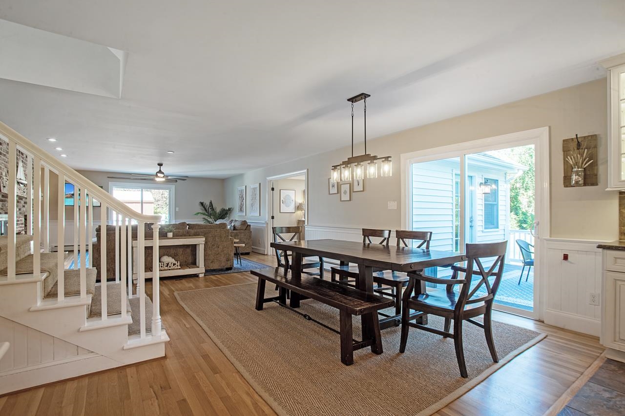 1015 Shunpike Road Cape May, NJ 08204 - Photo 4 of 34 a view of a dining room with furniture window and wooden floor